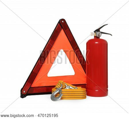 Emergency Warning Triangle, Towing Strap And Red Fire Extinguisher On White Background. Car Safety