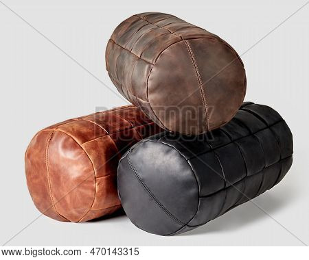 Three Comfortable Leather Bolster Cushions In Different Colors