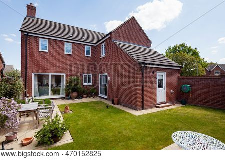 Longstanton, Cambridgeshire, England - May 16 2019: Typical Landscaped Garden Space On Modern Housin