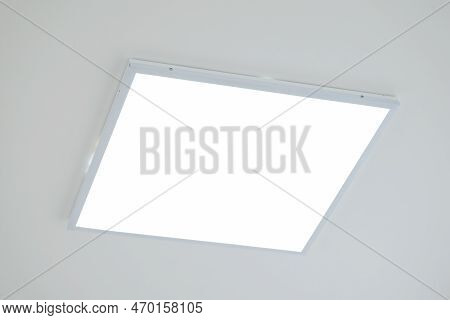 Close Up Shot Of Led Light On Ceiling. White Panel Of Modern Led Light On The Ceiling In Office