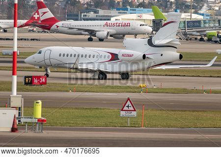 Zurich, Switzerland, January 20,2023 Dessault Falcon 7x Business Aircraft Is Taxiing To Its Takeoff 