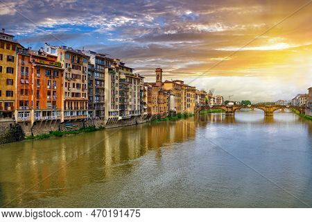 Scenic Sunset Cityscape Over Arno River, St Trinity Bridge And Colorful Old Houses Along The River I