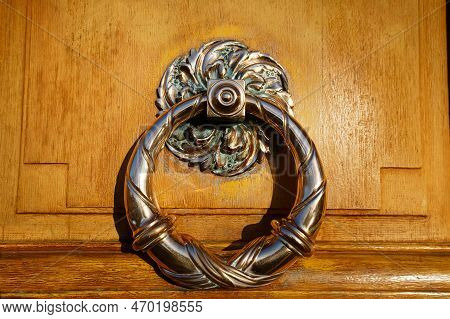 European Vintage Old Metal Wrought Iron Door Knocker. Design Detail. Paris.
