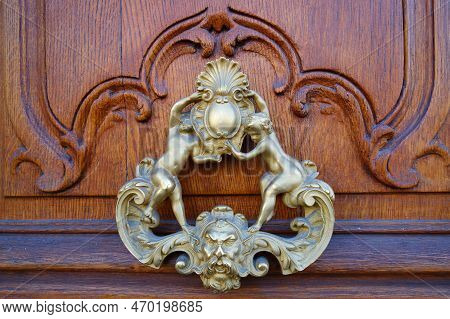 European Vintage Old Metal Wrought Iron Door Knocker. Design Detail. Paris.