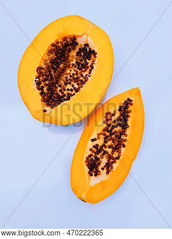 Sliced Papaya Fruit With Black Seeds Ripe Papaw Fresh Pawpaw Carica-papaya Fleshy Juicy Whole Papayy