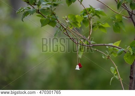 Symbol Of The First Day Of Spring Martisor. Tradition Of Giving Red And White Souvenir. Copy Space