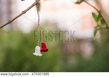 Symbol Of The First Day Of Spring Martisor. Tradition Of Giving Red And White Souvenir. Copy Space