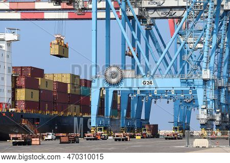 Shipping Port Of Haifa, Israel - October 25, 2021: Crane And Vehicle Activity At The Ship Port.