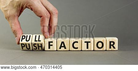 Pull Or Push Factor Symbol. Concept Word Pull Factor And Push Factor On Wooden Cubes. Beautiful Grey