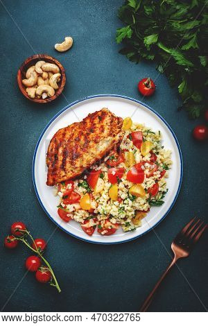 Roasted Chicken Breast With Tabbouleh Salad With Bulgur, Tomatoes And Parsley With Oil Lemon Dressin