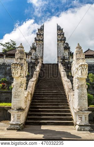 Ancient Gate At Pura Penataran Agung Lempuyang Temple And Volcano Agung On Bali, Indonesia In A Sunn