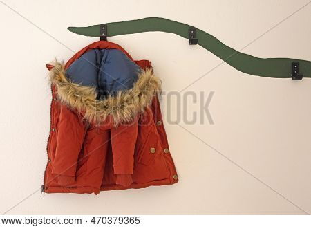 Winterjacket For A Baby Girl On A Creative Coathanger, Isolated