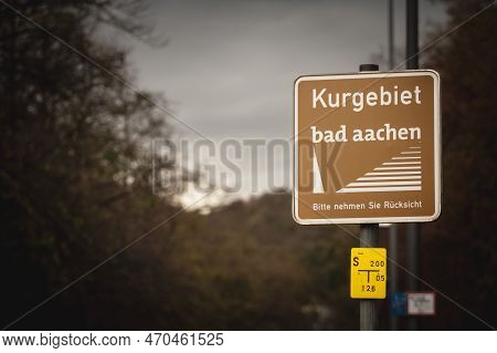 Aachen, Germany - November 8, 2022: Selective Blur On A Sign Indicating The Presence Of Bad Aachen, 
