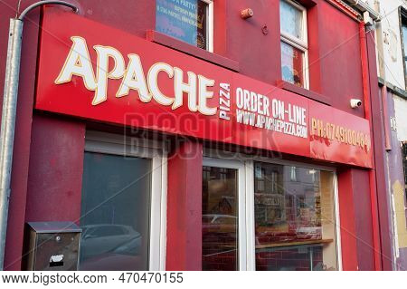 Dunfanaghy, Ireland- January 28, 2023:  The Front Of Apache Pizza Take Away In Dunfanaghy, County Do