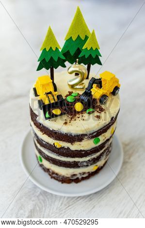 Birthday Cake For Two Year Old Boy, Decorated With Felt Trees And Construction Vehicles. Car Themed
