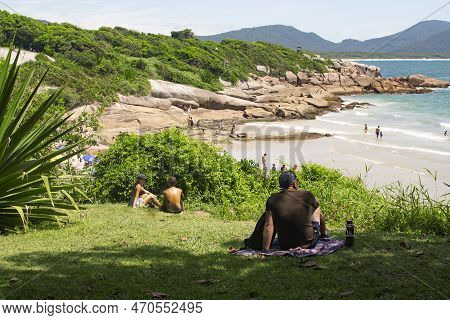 Florianopolis, Brazil - January 21, 2023 : People On The Beach Prainha Da Lagoa Admire The Scenery, 