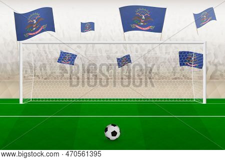 North Dakota Football Team Fans With Flags Of North Dakota Cheering On Stadium, Penalty Kick Concept