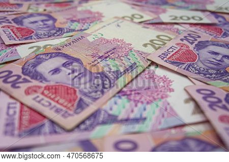 Ukrainian Money Background. Banknotes With A Face Value Of 200 Hryvnia Money Background. Ukrainian M