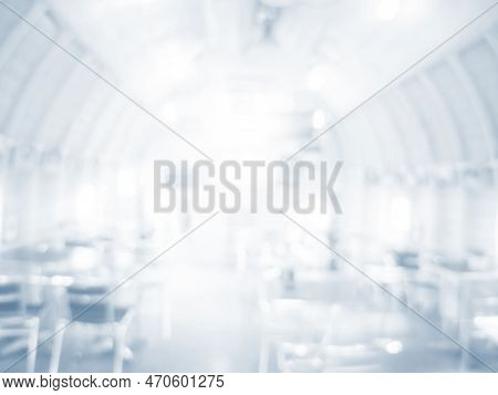 White Blurred Background Bright Restaurant Shopping Mall Silver Gray Lighting. Defocused Store Light