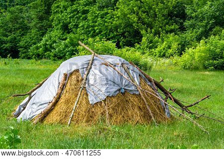 Photography On Theme Big Dry Haystack In Grass Farm Field