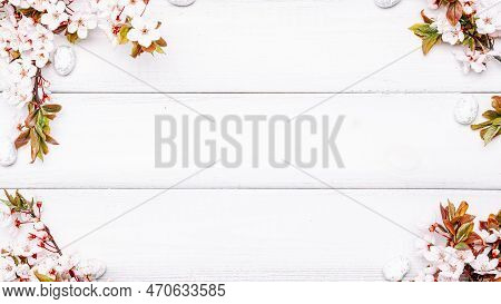 Easter Spring Background. Sakura Flower, White Happy Easter Egg On Wooden Spring Background. Easter 
