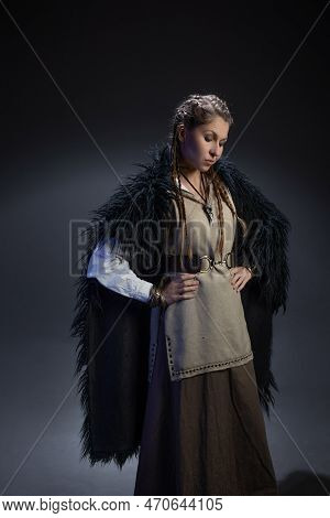 An Authoritative, Self-confident Woman In A Viking-style Fantasy Costume. Skirt With Shirt And Long 