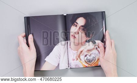 Fan Holding Stray Kids Maxident Mini Album Photobook On Grey. Music Cd. South Korean Boy Band Strayk