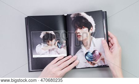 Fan Holding Stray Kids Maxident Mini Album Photobook On Grey. Music Cd. South Korean Boy Band Strayk