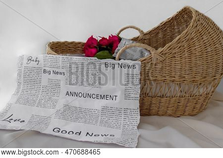 Baby Announcement With Basket, Pregnancy Announcement Background With Blurred . Selective Focus