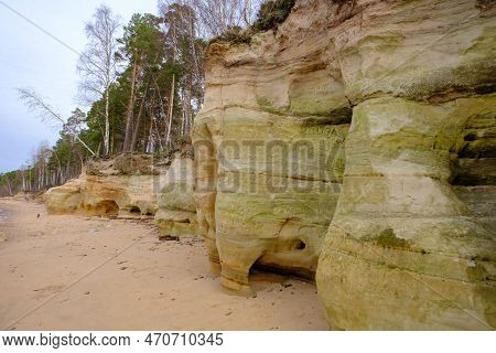 Beautiful In Any Weather, Colorful Sandstone Cliffs. Beautiful Coast Of The Baltic Sea With Caves. V