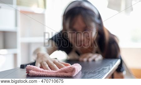 Housewife Is Cleaning Things Or Wipe Down And Dining Table In The House The Living Room, Big Cleanin