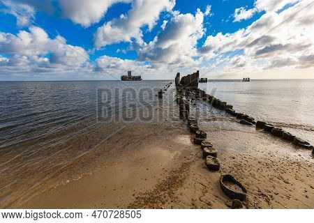 Gdynia, Poland - April 2022: Babie Doly Beach With Old Ruins Of Pier And Ruins Of Torpedo Room On Th