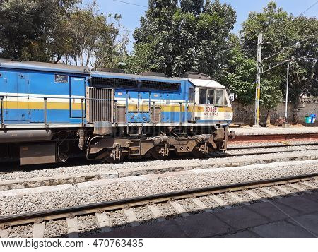 Closeup Of Beautiful Mandya Railway Station And Electric Train Moving On A Track.