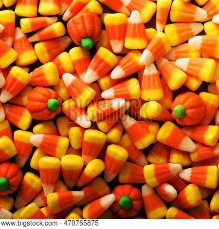 Candy Corn And Pumpkin Halloween Background Overhead Shot