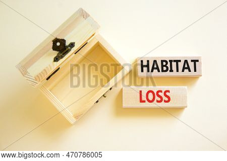 Habitat Loss Symbol. Concept Words Habitat Loss On Wooden Block. Beautiful White Table White Backgro