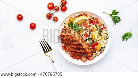 Grilled Chicken Breast Fillet With Tabbouleh Salad With Bulgur, Tomato And Parsley With Lemon Dressi