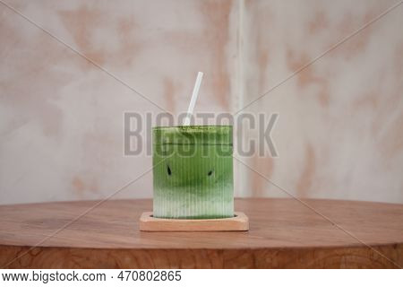 Iced Matcha Greentea On Wooden Table, Stock Photo
