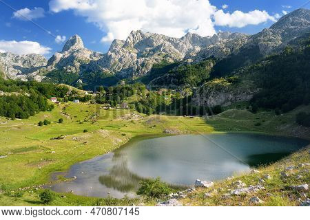 Breathtaking Landscape Of Mountain Valley With Bukumirsko Lake In Alps Of Montenegro. Stunning View 