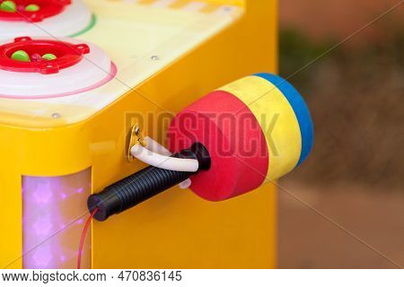 Hammer On The Top Of A Whac-a-mole Arcade Game In A Carnival.