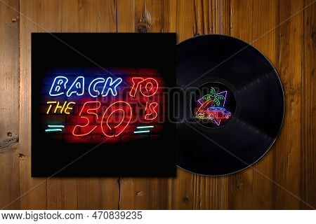 Close-up On Wood Board With A Vinyl Record On Its Middle With A Fake Compilation Of Songs From The 5