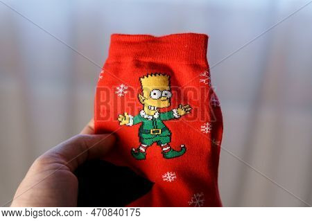 Tyumen, Russia-january 23, 2023: Bart Simpson From The Simpsons Animated Series Logo On Clothes, Chr