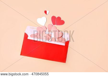 Red Envelope With Pink And Red Hearts. Greeting Card