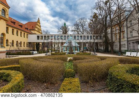 Sopot, Poland - April 2022: Small Green Otto Bowen Square With Small Fountain In Center