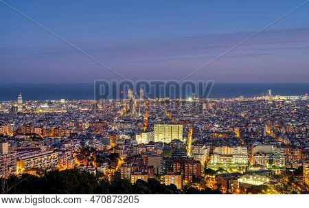 The Skyline Of Barcelona In Spain At Twilight