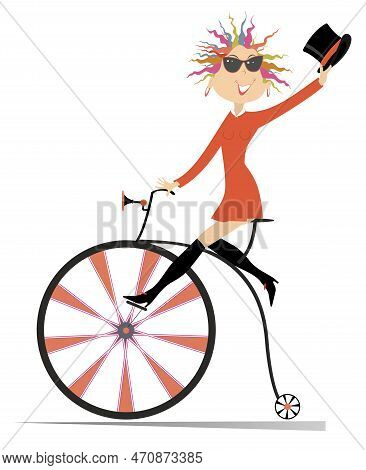 Young Woman Rides On A Vintage Bike. 
Sexy Young Woman With A Top Hat Riding On A Penny-farthing. Is