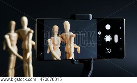 Mobile Phone Photographs The Relationship Between Two Mannequins. The Concept Of Hidden Shooting, Pa
