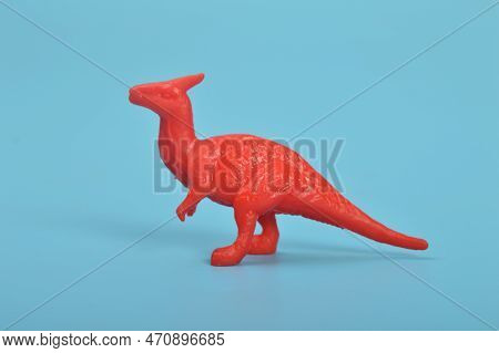 Parasaurolophus Dinosaur Toy Model Isolated On A Blue Background