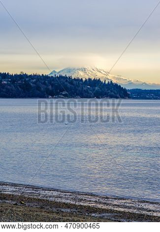 Clouds Cover Mount Rainier Across The Puget Soud In Washington State.
