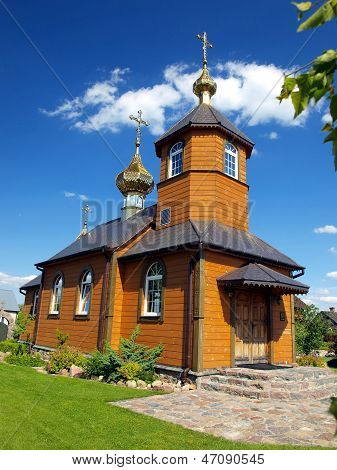 Picturesque Wooden Orthodox Church In The Village Kostomloty In Eastern Poland