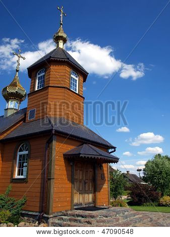 Picturesque Wooden Orthodox Church In The Village Kostomloty In Eastern Poland